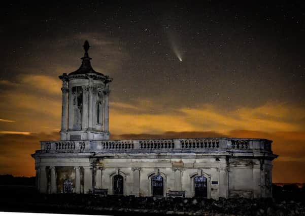 The Neowise comet in the sky above Normanton Church at Rutland Water in July.