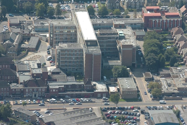 This aerial picture shows the old Peterborough District Hospital in Thorpe Road. The site has been extensively redeveloped with scores of new homes and a new school,  West Town Academy. The school incorporated the frontage of the Memorial Hospital (bottom left of the picture).