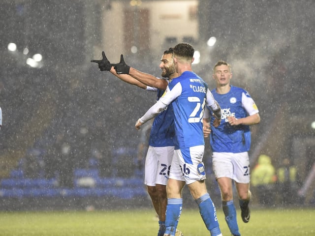 Serhat Tasdemir celebrates a Posh goal against West Ham United in the EFL Trophy.