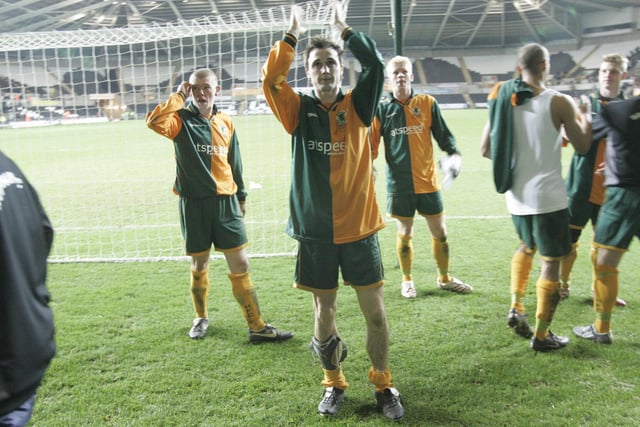 Gary Charman and Horsham players applaud the fans