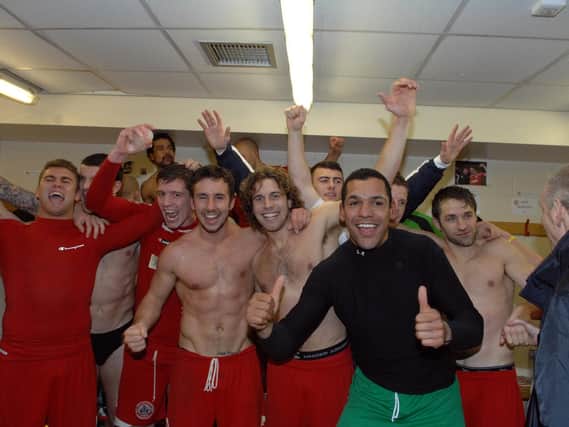 Crawley Town players in the changing room after the game