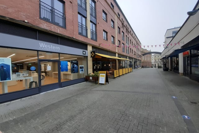 Regent Court in Leamington during 'Lockdown 3.0' where some restaurants and Western Computer are still open for click and collect and takeaway services.