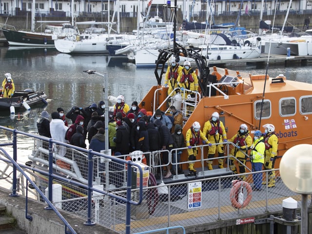Dozens of people were rescued from a stranded boat