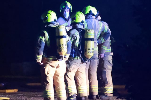 Firefighters worked through the night to extinguish a blaze at an industrial site in Bosham. Photo: Eddie Mitchell