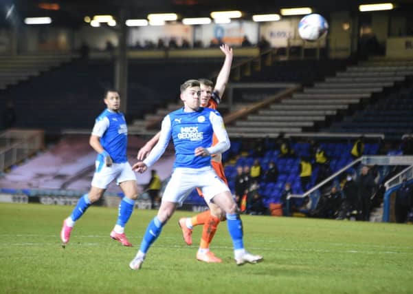 Sammie Szmodics in action for Posh against Portsmouth. Photo: David Lowndes.