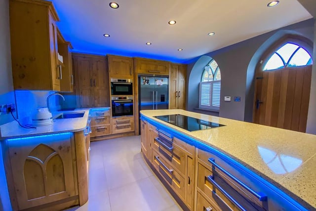 Here is the spacious and modern kitchen / breakfast room, which contains an island.