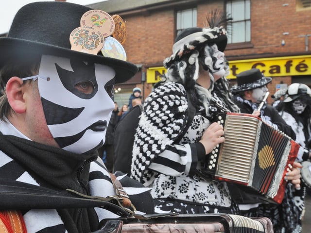 Morris dancing in Market Street at 2019's Straw Bear.