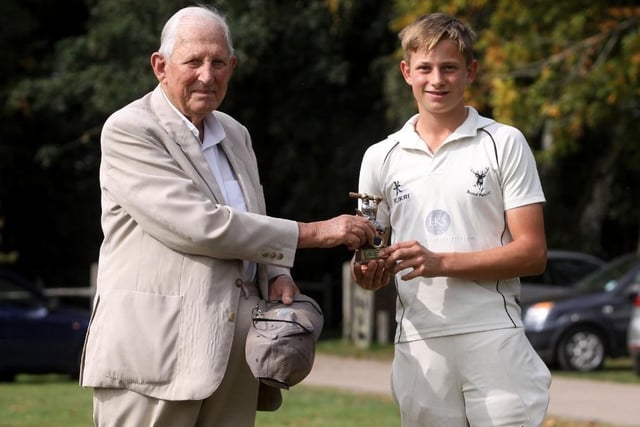 Buxted's Alfie Hunter, a star of the Sussex Junior Cricket Festival, with his grandfather, local author Peter Hunter / Picture by Ron Hill