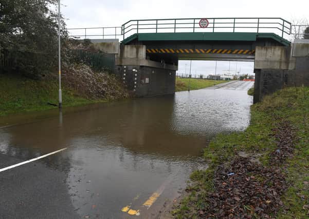Flood water under the railway bridge on Boston Road, Sleaford. EMN-210120-174633001