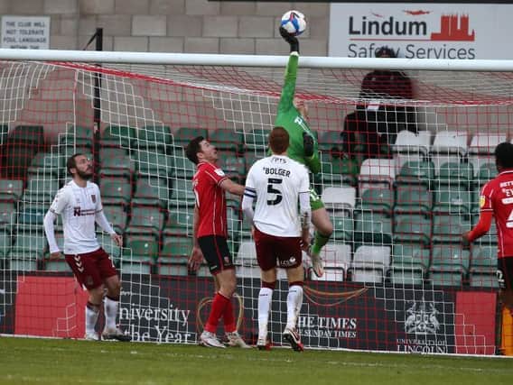 Jonathan Mitchell tips the ball over his crossbar. Pictures: Pete Norton