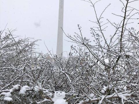 A mini snow lady with the lift tower in the background. Photo: Tracey Bushell