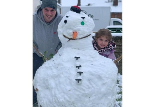 Poppi and her dad, Wayne, made a snowman in Warners End