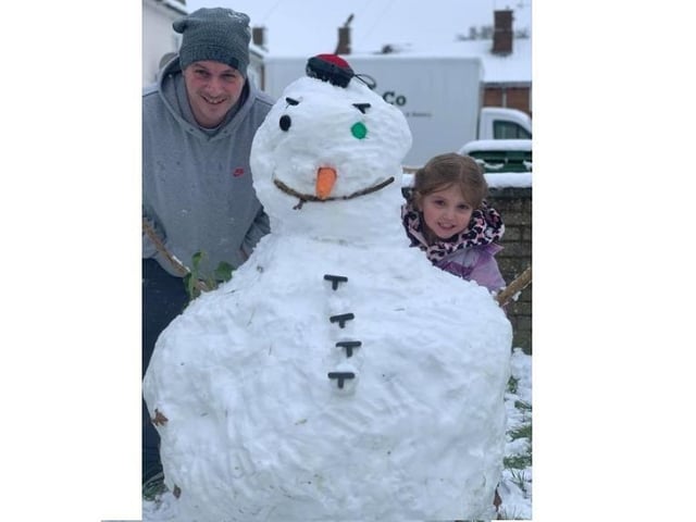 Poppi and her dad, Wayne, made a snowman in Warners End
