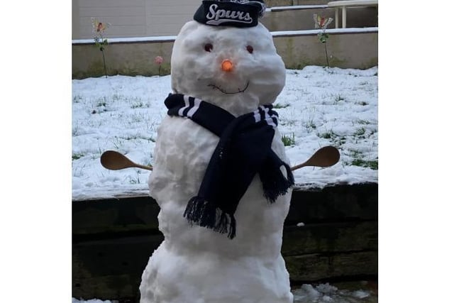 Jules Harris created a Spurs mascot with the snow in her garden in Hemel Hempstead