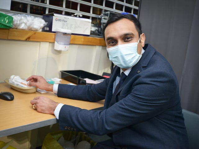 Ticehurst Pharmacy administering the Covid-19 vaccine (Oxford AstraZeneca) at Ticehurst Village Hall. Pic Justin Lycett.
The head pharmacist Hardik Desai SUS-210121-131341001