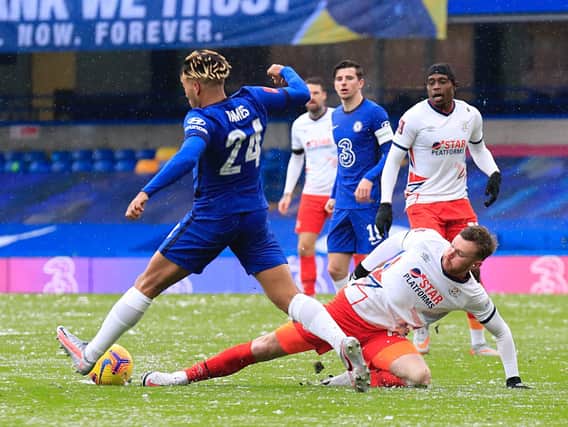 Ryan Tunnicliffe makes a sliding challenge during Luton's 3-1 FA Cup defeat to Chelsea