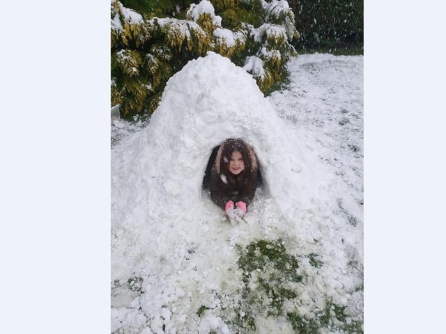Aimee Nev and family get to work building their snow creations.
