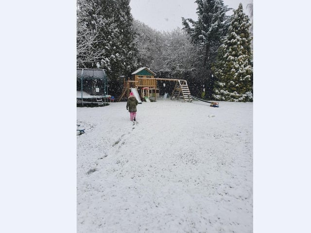 Aimee Nev and family get to work building their snow creations.