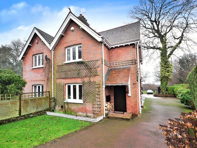This exceptional four bedroom character home has a gated paddock and extensive grounds. Price: £700,000.