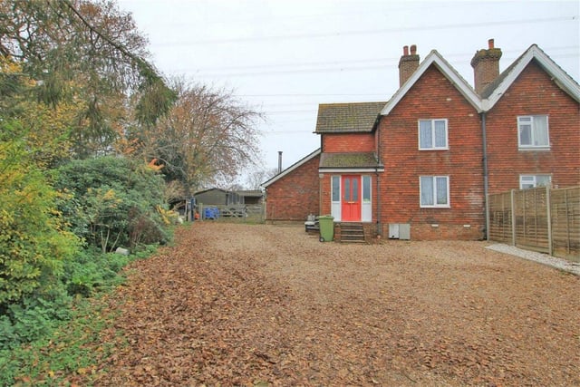 Red House is a three bedroom semi-detached period cottage with fields divided into two main paddocks and stable block. Price: £610,000.