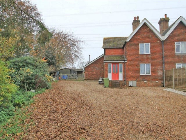 Red House is a three bedroom semi-detached period cottage with fields divided into two main paddocks and stable block. Price: £610,000.