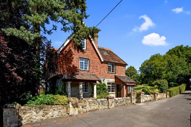 Water Mill House is a spacious five bedroom detached house with detached home office and five acres of gardens and paddocks. Price: £980,000.