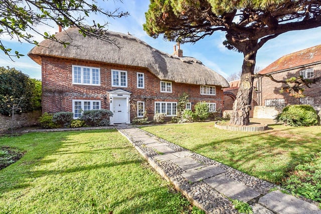 The Homestead is a Grade II listed cottage built in the 1600s with five/six bedrooms and a paddock area with stable and tack room. Price: £895,000.