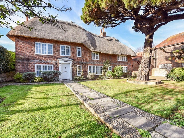 The Homestead is a Grade II listed cottage built in the 1600s with five/six bedrooms and a paddock area with stable and tack room. Price: £895,000.