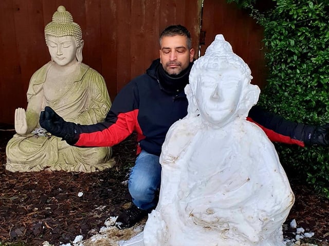 Piyus Tanna-Shah with his snow Buddha. Photo: Sheena Tanna-Shah