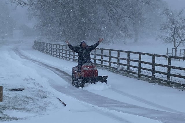Mark Goodall clearing the snow at Badby Park neurological care centre in Daventry on his mini snowplow. Photo: Andrea Goodall