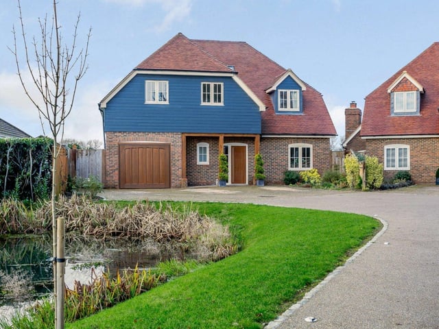 This stylish detached family home offers modern light-filled accommodation in a neutral decor arranged over two floors. Price: £1,295,000.