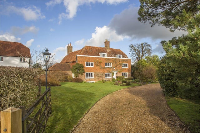 A handsome and historic Grade II listed house with two successful holiday homes, outbuildings and land of about 10 acres. Price: £1,675,000.