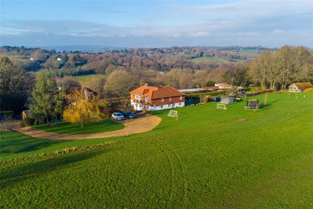 An impressive and well presented family house, nicely set in a fine semi-rural location, with a good landholding and lovely views. Price: £1,250,000.