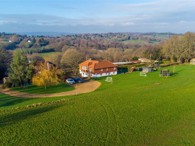 An impressive and well presented family house, nicely set in a fine semi-rural location, with a good landholding and lovely views. Price: £1,250,000.
