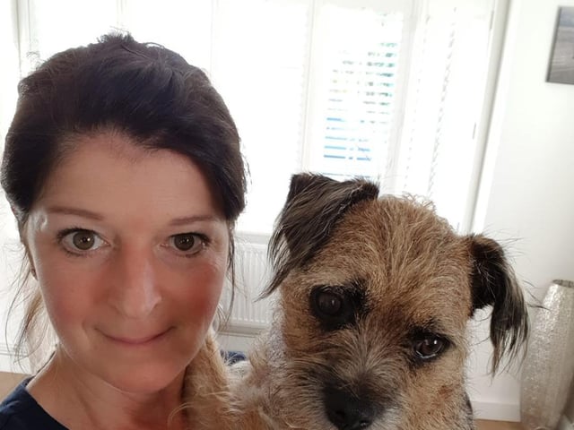 A lovely picture of Sara Witten with Holly the dog
