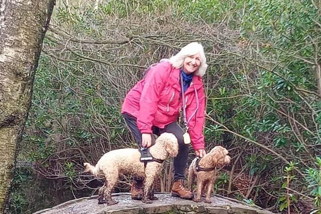 Val Fryer out on a walk with Ruby and Bailey