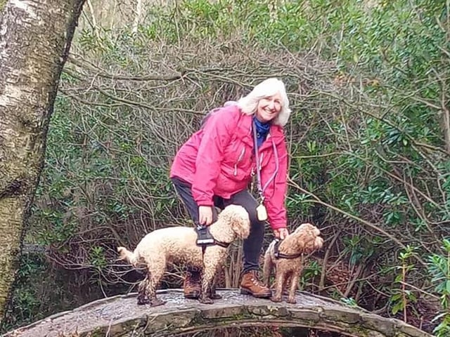 Val Fryer out on a walk with Ruby and Bailey