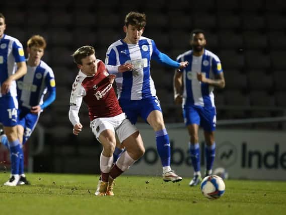 Cobblers were shrugged aside by Wigan on Tuesday. Pictures: Pete Norton.