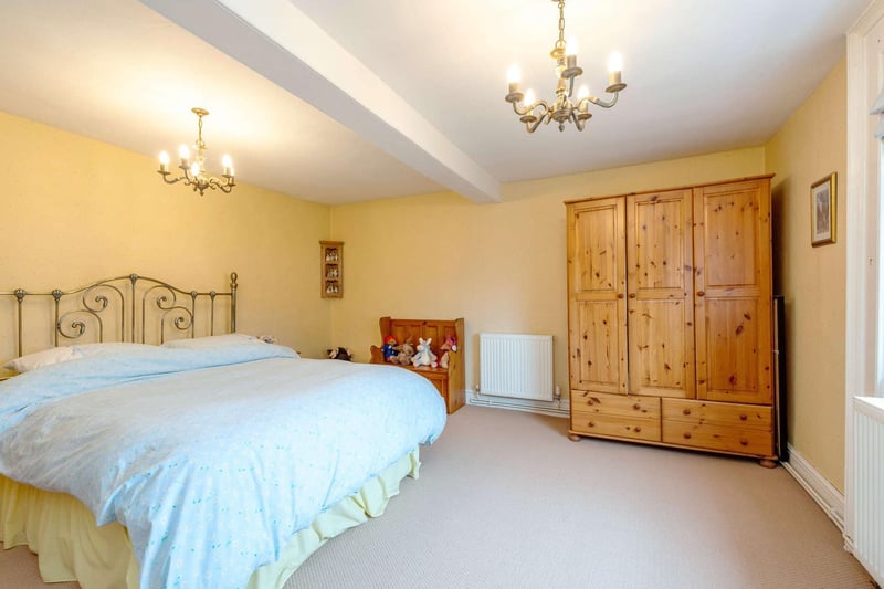 The guest bedroom is a large double room benefitting from fitted wardrobes and a shower room en suite.