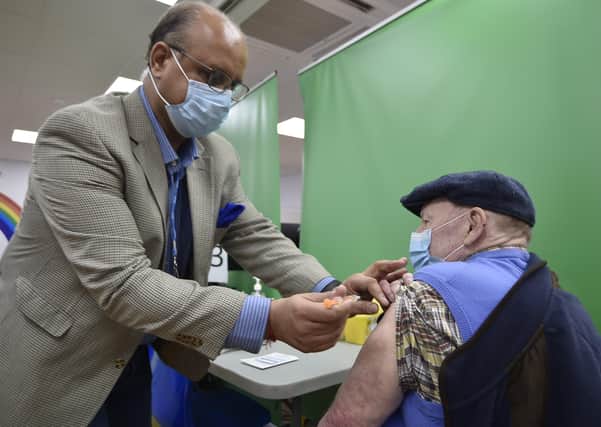 Orton Wistow Halls the Chemist Covid-19 vaccination clinic. Sanjay Adatia administering jabs.