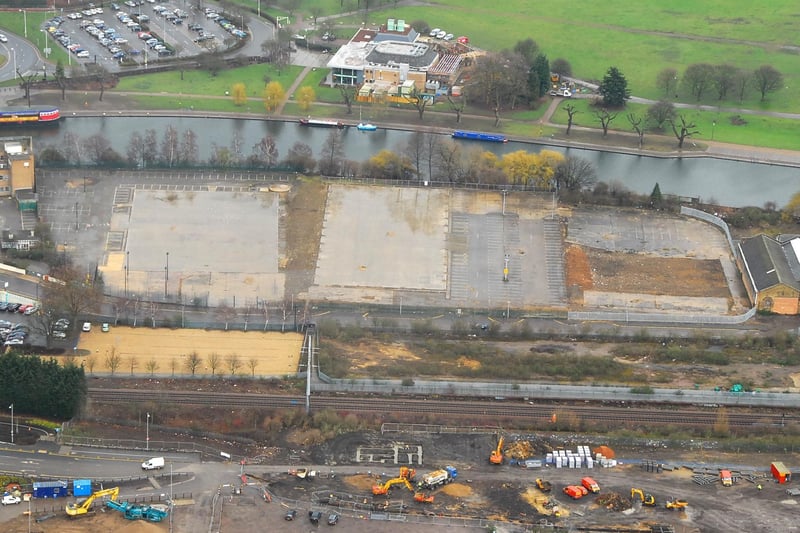 This picture was taken nine years ago and the scene has changed dramatically in the intervening years. It shows work underway clearing the south bank for what has now become known as Fletton Quays. If  you took a picture from the same spot todaythe view of the Key Theatre on the other side of the Nene would be blocked by flats.