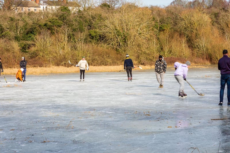 People skating on the frozen Welches Meadow today (Saturday February 13).