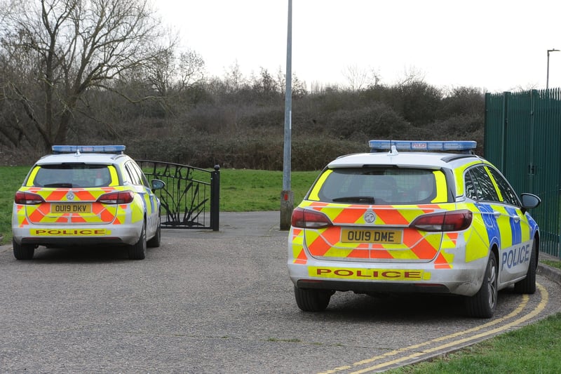 Police vehicles near The Fleet Complex close to the entrance to Fletton Lake.