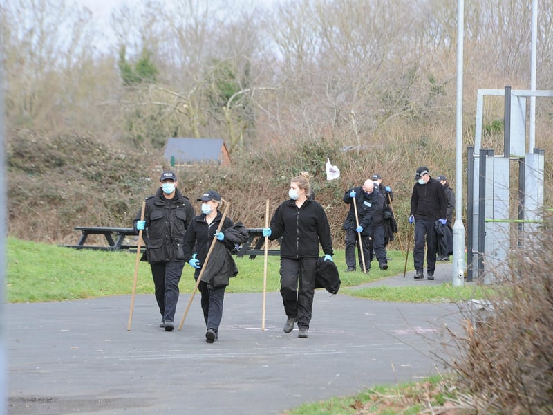 Police  searching  the play areas and allotments near Winyates,  Orton Goldhay.