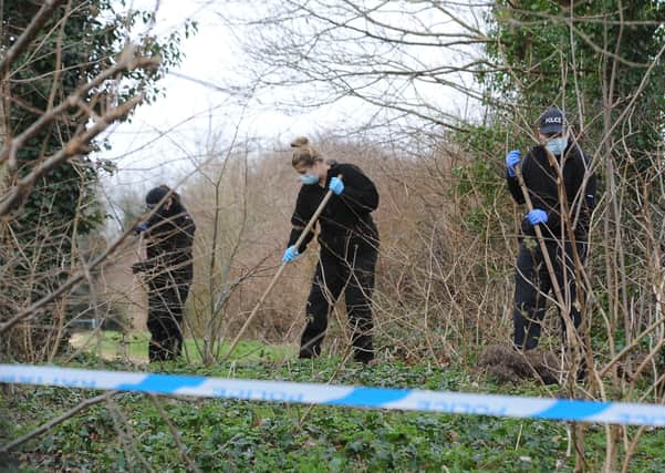 Police searching  the play areas and allotments near Winyates,  Orton Goldhay. Pictures: David Lowndes