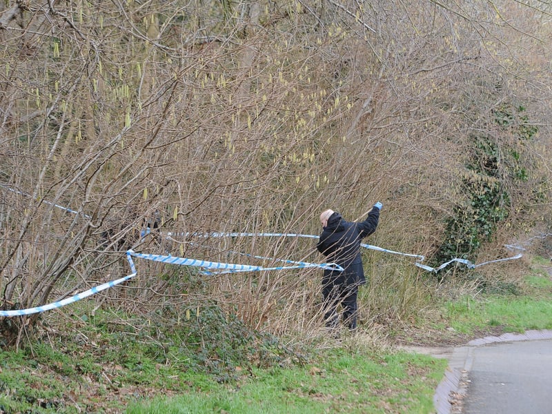 Police  searching parkland near Winyates,  Orton Goldhay .