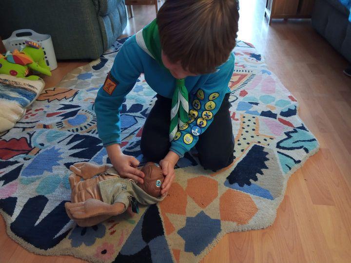 Joe doing first aid