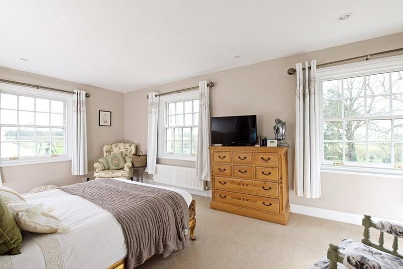 The master bedroom has dual aspect sash windows with far reaching views over the surrounding countryside.