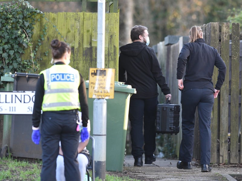 Police officers entering a property  at Ellindon, North Bretton. Pictures: David Lowndes