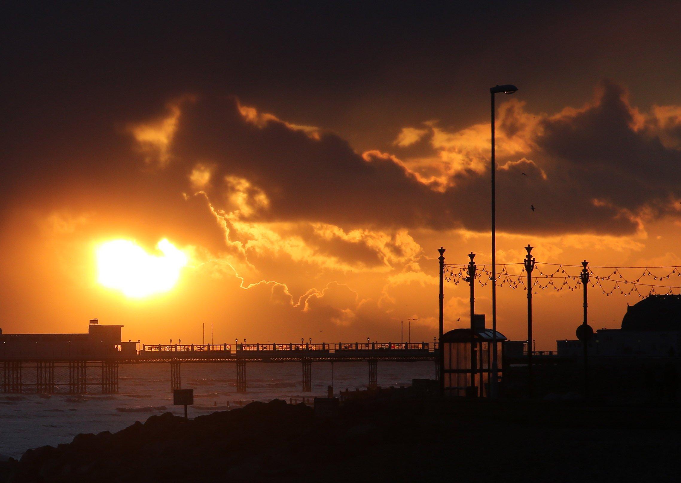 A spot on Worthing seafront has been named among the 25 best places in the world to watch the sun set